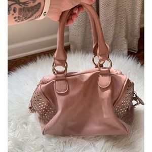 Pink-neutral rose gold handbag